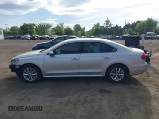 2016 Volkswagen Passat S with VIN 1VWAT7A39GC014305, listed as a IAAI auction lot 42144322 with 187,419 mi miles and . Bid and sale history available at DreamBid. Image 15.