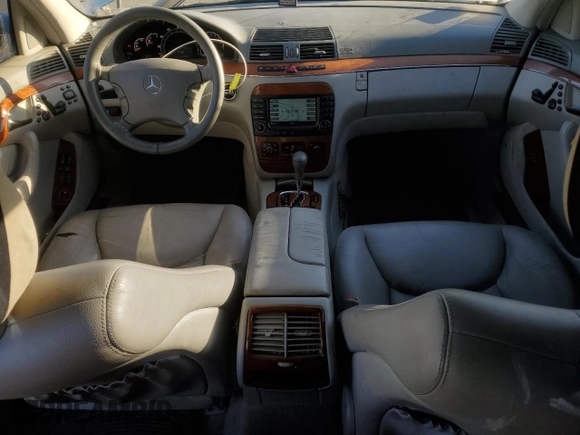 2005 Mercedes-Benz S-Class 4.3L with VIN WDBNG70J15A453434, listed as a Copart auction lot 77212554 with 247,643 mi miles and Clean Title. Bid and sale history available at carsss.com. Image 8.