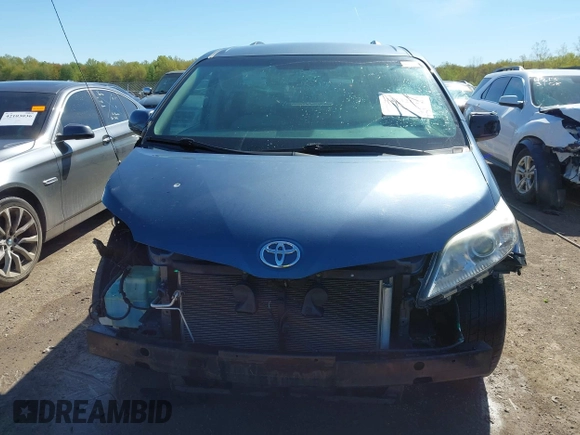 2014 Toyota Sienna LE AAS with VIN 5TDKK3DC4ES464647, listed as a IAAI auction lot 42132627 with 130,724 mi miles and . Bid and sale history available at DreamBid. Image 13.