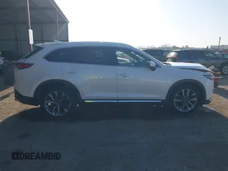 2016 Mazda CX-9 Grand Touring z VIN JM3TCADY6G0125547, wystawiony jako IAAI lot #41997445 z przebiegiem 129 179 mil mil oraz . Historia ofert i sprzedaży dostępna na DreamBid. Obrazek 13.