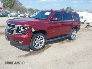 2019 Chevrolet Tahoe LT z VIN 1GNSCBKC9KR102552, wystawiony jako IAAI lot #41792517 z przebiegiem 92 856 mil mil oraz . Historia ofert i sprzedaży dostępna na DreamBid. Obrazek 2.