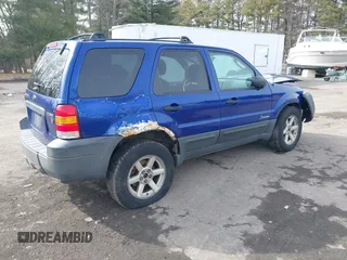 2005 Ford Escape Hybrid with VIN 1FMCU96HX5KC07148, listed as a IAAI auction lot 41741158 with 225,598 mi miles. Bid and sale history available at carsss.com. Image 4.