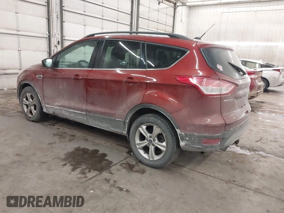 2014 Ford Escape SE with VIN 1FMCU9GXXEUD96930, listed as a IAAI auction lot 41574851 with 140,252 mi miles. Bid and sale history available at carsss.com. Image 3.