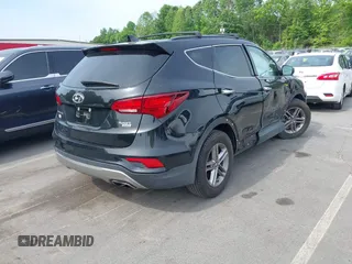 2017 Hyundai Santa Fe 2.4L with VIN 5NMZUDLB4HH030064, listed as a IAAI auction lot 42288147 with 89,297 mi miles and . Bid and sale history available at DreamBid. Image 4.