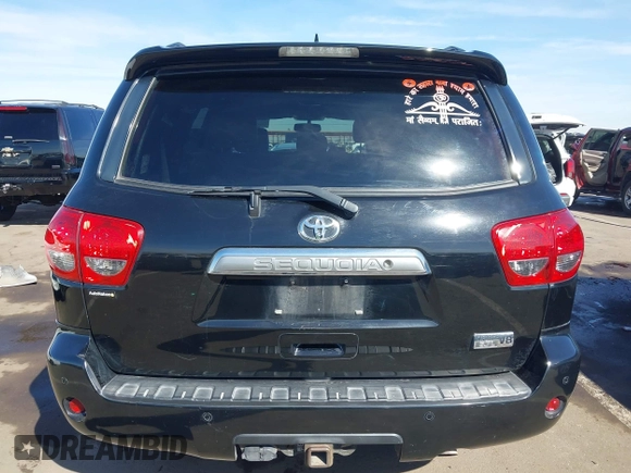 2014 Toyota Sequoia Limited with VIN 5TDKY5G13ES055656, listed as a IAAI auction lot 41616322 with 118,859 mi miles. Bid and sale history available at carsss.com. Image 16.