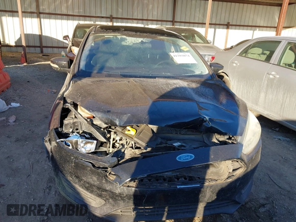 2017 Ford Focus SE with VIN 1FADP3F21HL288487, listed as a IAAI auction lot 41393074 with 87,883 mi miles. Bid and sale history available at carsss.com. Image 12.