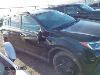 2018 Toyota RAV4 LE with VIN 2T3BFREV8JW706999, listed as a IAAI auction lot 41863485 with 115,589 mi miles. Bid and sale history available at carsss.com. Image 13.