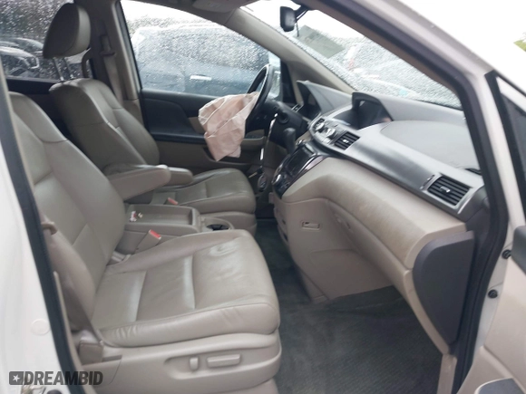 2015 Honda Odyssey Touring Elite with VIN 5FNRL5H98FB076428, listed as a IAAI auction lot 41998339 with 114,573 mi miles. Bid and sale history available at carsss.com. Image 5.