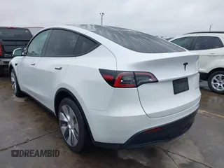2022 Tesla Model Y Long Range with VIN 7SAYGDEE3NF380067, listed as a IAAI auction lot 41016704 with 52,180 mi miles and . Bid and sale history available at DreamBid. Image 3.