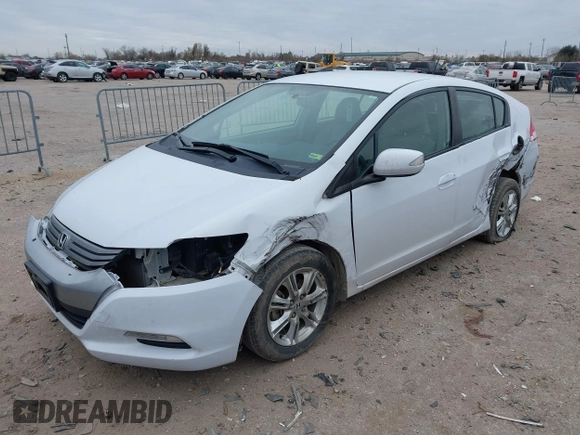 2010 Honda Insight EX with VIN JHMZE2H71AS035091, listed as a IAAI auction lot 41380128 with 181,653 mi miles and . Bid and sale history available at DreamBid. Image 18.