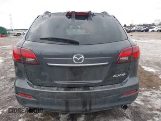 2015 Mazda CX-9 Grand Touring with VIN JM3TB2DAXF0447537, listed as a IAAI auction lot 41191694 with 157,113 mi miles. Bid and sale history available at carsss.com. Image 16.