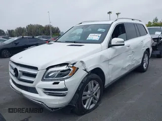 2014 Mercedes-Benz GL 450 z VIN 4JGDF7CE0EA424081, wystawiony jako IAAI lot #42359465 z przebiegiem 145 363 mil mil oraz . Historia ofert i sprzedaży dostępna na DreamBid. Obrazek 2.