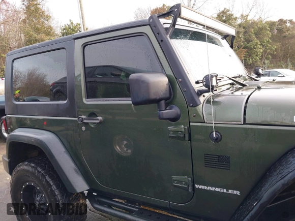2009 Jeep Wrangler Rubicon z VIN 1J8GA64169L743008, wystawiony jako IAAI lot #41792451 z przebiegiem 142 414 mil mil oraz . Historia ofert i sprzedaży dostępna na DreamBid. Obrazek 13.