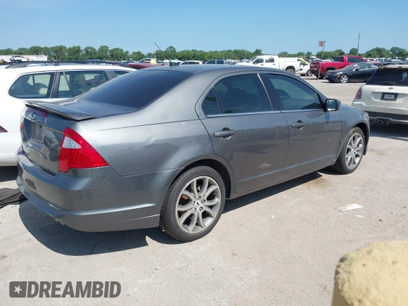 2012 Ford Fusion SE with VIN 3FAHP0HA0CR425806, listed as a IAAI auction lot 42695893 with 147,343 mi miles and . Bid and sale history available at DreamBid. Image 4.