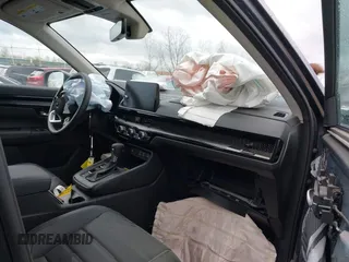 2025 Honda CR-V EX-L with VIN 2HKRS4H73SH422036, listed as a IAAI auction lot 42070807 with 1,735 mi miles and . Bid and sale history available at DreamBid. Image 5.