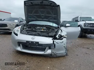 2010 Nissan 370Z Touring z VIN JN1AZ4EH9AM503264, wystawiony jako IAAI lot #42180901 z przebiegiem Nie podano mil oraz . Historia ofert i sprzedaży dostępna na DreamBid. Obrazek 6.