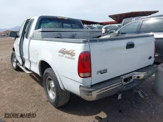 1998 Ford F-150 Standard with VIN 1FTRX18L4WKA19929, listed as a IAAI auction lot 41573331 with 337,558 mi miles. Bid and sale history available at carsss.com. Image 3.