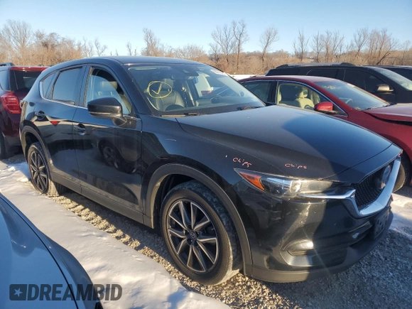 2018 Mazda CX-5 Touring z VIN JM3KFACM9J0300642, wystawiony jako Copart lot #80210854 z przebiegiem 118 309 mil mil oraz Szkoda całkowita • Salvage title. Historia ofert i sprzedaży dostępna na DreamBid. Obrazek 4.
