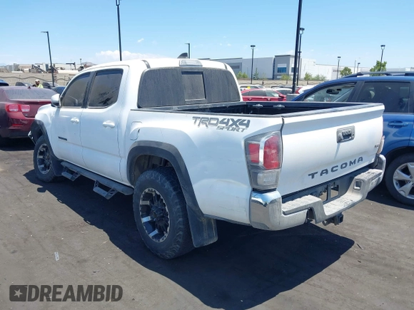 2023 Toyota Tacoma SR with VIN 3TMCZ5AN4PM558760, listed as a IAAI auction lot 42626514 with 39,335 mi miles and . Bid and sale history available at DreamBid. Image 3.