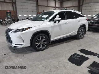 2020 Lexus RX with VIN 2T2HGMDA9LC043542, listed as a IAAI auction lot 41498131 with 63,689 mi miles. Bid and sale history available at carsss.com. Image 2.