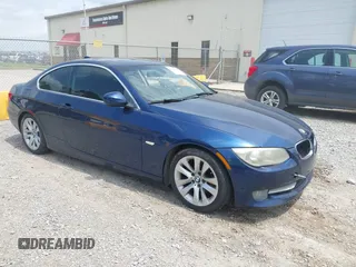 2011 BMW 3 Series 328i with VIN WBAKE3C52BE557501, listed as a IAAI auction lot 42138050 with 209,575 mi miles and . Bid and sale history available at carsss.com. Image 1.