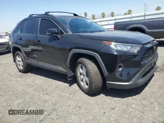 2021 Toyota RAV4 XLE with VIN 2T3P1RFV8MC167485, listed as a Copart auction lot 57814355 with 73,188 mi miles and Salvage title. Bid and sale history available at DreamBid. Image 4.