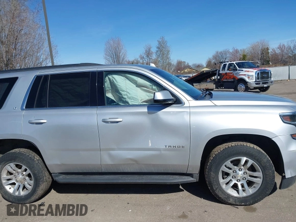 2018 Chevrolet Tahoe LT with VIN 1GNSKBKC3JR195215, listed as a IAAI auction lot 41847254 with 67,328 mi miles and . Bid and sale history available at DreamBid. Image 13.