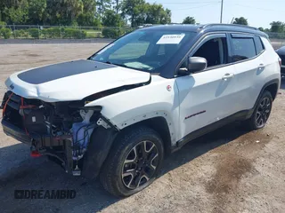 2021 Jeep Compass Trailhawk with VIN 3C4NJDDB7MT564467, listed as a IAAI auction lot 42330939 with 76,963 mi miles and . Bid and sale history available at DreamBid. Image 17.