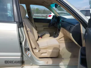 2006 Subaru Forester 2.5 X with VIN JF1SG63636H705351, listed as a IAAI auction lot 41957115 with 206,418 mi miles. Bid and sale history available at carsss.com. Image 5.
