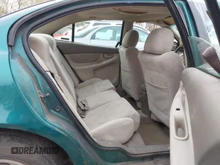 1999 Oldsmobile Alero GL z VIN 1G3NL52T7XC398799, wystawiony jako IAAI lot #41911602 z przebiegiem 252 504 mil mil oraz . Historia ofert i sprzedaży dostępna na DreamBid. Obrazek 8.
