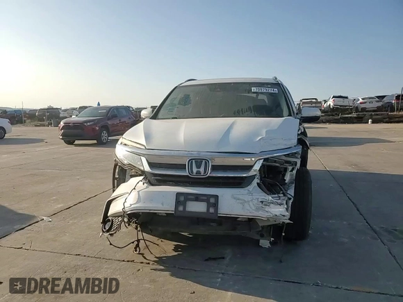 2020 Honda Pilot Touring 8-Passenger with VIN 5FNYF5H97LB009821, listed as a Copart auction lot 70979274 with 70,322 mi miles and Salvage Title. Bid and sale history available at DreamBid. Image 12.