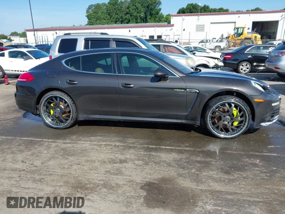2014 Porsche Panamera S E-Hybrid with VIN WP0AD2A76EL044591, listed as a IAAI auction lot 42436817 with 89,009 mi miles and . Bid and sale history available at DreamBid. Image 13.