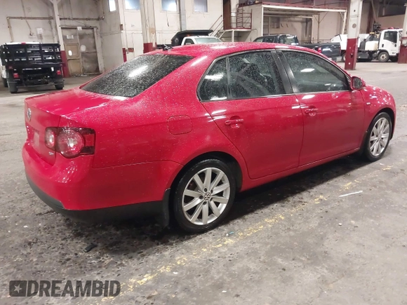 2010 Volkswagen Jetta Wolfsburg Edition with VIN 3VWRA7AJXAM151864, listed as a IAAI auction lot 41856572 with 137,152 mi miles and . Bid and sale history available at DreamBid. Image 4.