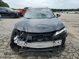 2023 Lexus UX 250h Premium с VIN JTHP6JBH8P2133821, выставлен на аукционе Copart как лот 61007355 с пробегом 32 540 миль миль и Списание • Salvage title. История ставок и продаж доступна на DreamBid. Изображение 5.