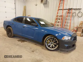 2014 Dodge Charger Police with VIN 2C3CDXAT5EH218901, listed as a IAAI auction lot 41723531 with 216,643 mi miles. Bid and sale history available at carsss.com. Image 1.