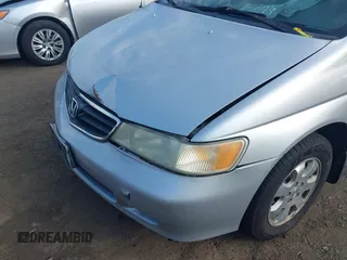 2003 Honda Odyssey EX-L with VIN 5FNRL18913B061340, listed as a IAAI auction lot 42633790 with 1,281,195 mi miles and . Bid and sale history available at DreamBid. Image 6.