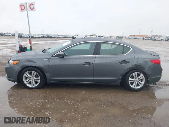 2014 Acura ILX Hybrid Technology z VIN 19VDE3F75EE300312, wystawiony jako IAAI lot #41608572 z przebiegiem 126 974 mil mil oraz . Historia ofert i sprzedaży dostępna na DreamBid. Obrazek 14.