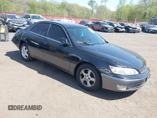 1999 Lexus ES 300 with VIN JT8BF28G2X0214680, listed as a IAAI auction lot 42149464 with 218,450 mi miles and . Bid and sale history available at DreamBid. Image 1.