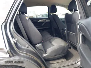 2021 Mazda CX-9 Sport with VIN JM3TCBBY7M0520437, listed as a IAAI auction lot 42022562 with 77,063 mi miles and . Bid and sale history available at DreamBid. Image 8.
