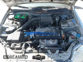 1997 Honda Civic DX with VIN 1HGEJ6220VL106203, listed as a IAAI auction lot 42098813 with 192,343 mi miles. Bid and sale history available at carsss.com. Image 10.