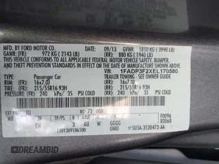 2014 Ford Focus SE with VIN 1FADP3F2XEL170580, listed as a IAAI auction lot 41752699 with 102,666 mi miles. Bid and sale history available at carsss.com. Image 9.