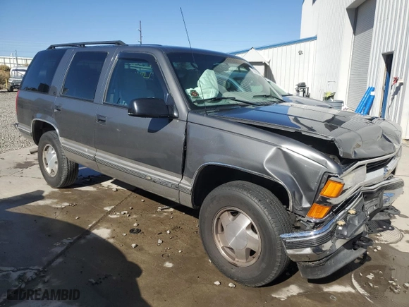 1999 Chevrolet Tahoe Z71 with VIN 1GNEK13RXXR135208, listed as a Copart auction lot 72838684 with 120,330 mi miles and Salvage Title. Bid and sale history available at carsss.com. Image 4.