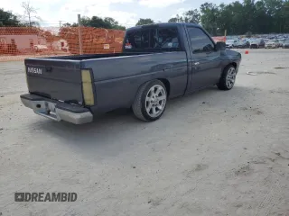 1996 Nissan Frontier XE z VIN 1N6SD11S0TC311270, wystawiony jako Copart lot #53870965 z przebiegiem 145 595 mil mil oraz Szkoda całkowita • Salvage title. Historia ofert i sprzedaży dostępna na DreamBid. Obrazek 3.