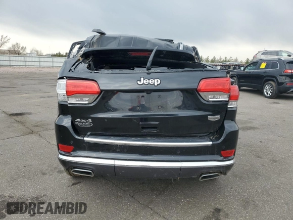 2015 Jeep Grand Cherokee Summit with VIN 1C4RJFJG2FC913658, listed as a Copart auction lot 52160035 with 138,008 mi miles and Salvage Title. Bid and sale history available at DreamBid. Image 6.
