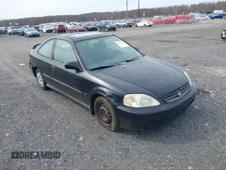 1999 Honda Civic EX with VIN 1HGEJ8247XL023853, listed as a IAAI auction lot 41840783 with 163,287 mi miles. Bid and sale history available at carsss.com. Image 1.
