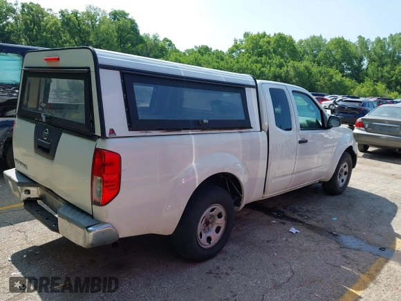 2013 Nissan Frontier S with VIN 1N6BD0CT2DN721770, listed as a IAAI auction lot 42385357 with 239,276 mi miles and . Bid and sale history available at DreamBid. Image 4.