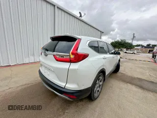 2019 Honda CR-V EX z VIN 7FARW1H50KE036985, wystawiony jako Copart lot #61110265 z przebiegiem 193 050 mil mil oraz Czysty tytuł • Clean title. Historia ofert i sprzedaży dostępna na DreamBid. Obrazek 4.