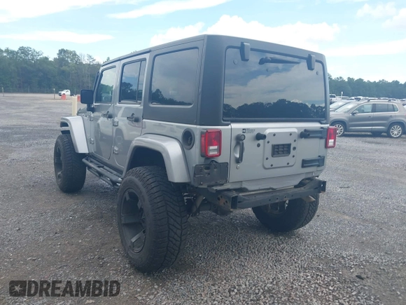 2016 Jeep Wrangler Unlimited Sahara with VIN 1C4BJWEG5GL117872, listed as a IAAI auction lot 42692798 with 119,819 mi miles and . Bid and sale history available at DreamBid. Image 3.