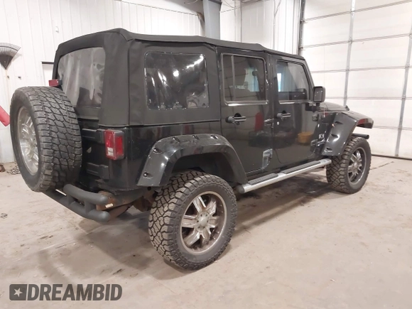 2008 Jeep Wrangler Unlimited X with VIN 1J4GA391X8L558984, listed as a IAAI auction lot 41016498 with 123,308 mi miles. Bid and sale history available at carsss.com. Image 4.