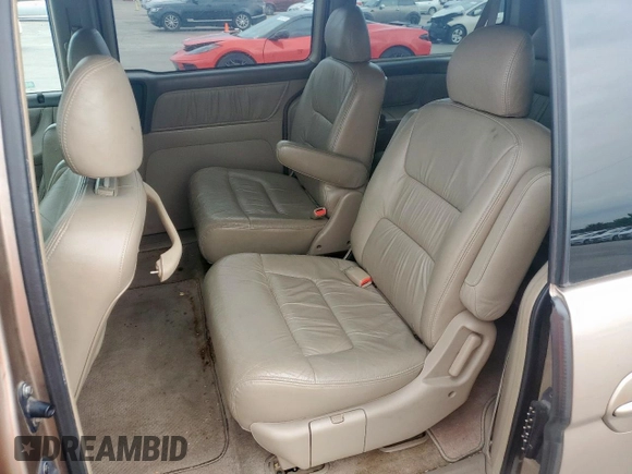2004 Honda Odyssey EX-L with VIN 5FNRL18944B107051, listed as a Copart auction lot 58542335 with 207,951 mi miles and Salvage title. Bid and sale history available at DreamBid. Image 11.